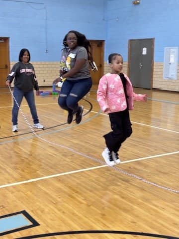 Children playing an active game in the gym at Impact City Church
